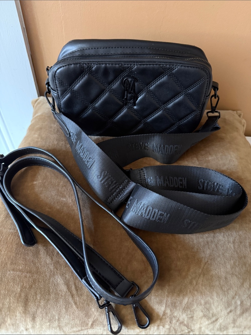 Steve Madden Black Quilted Bag with Logo Strap has two types of belt straps